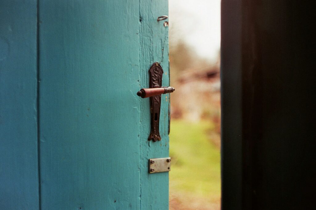 An image of a door opening to the unknown